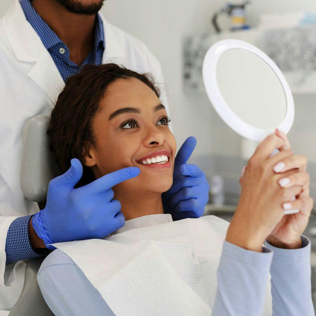 teeth whitening queens dentist
